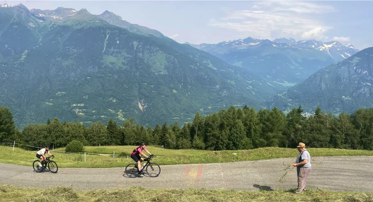 Cyclists tackling the steep ramps of Mortirolo in the Italian Alps