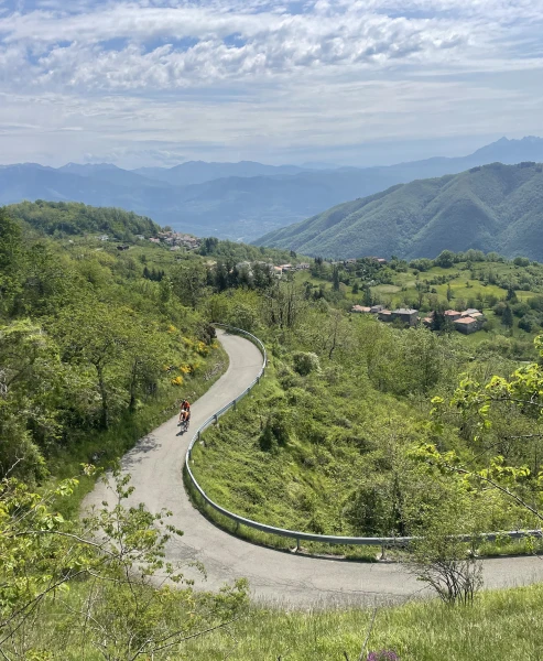 Cyclist climbing Passo della Cisa in the Tuscan-Emilian Apennines