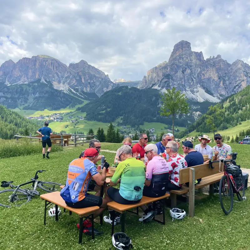 Group picnic on Passo Campolongo during the Sella Ronda loop