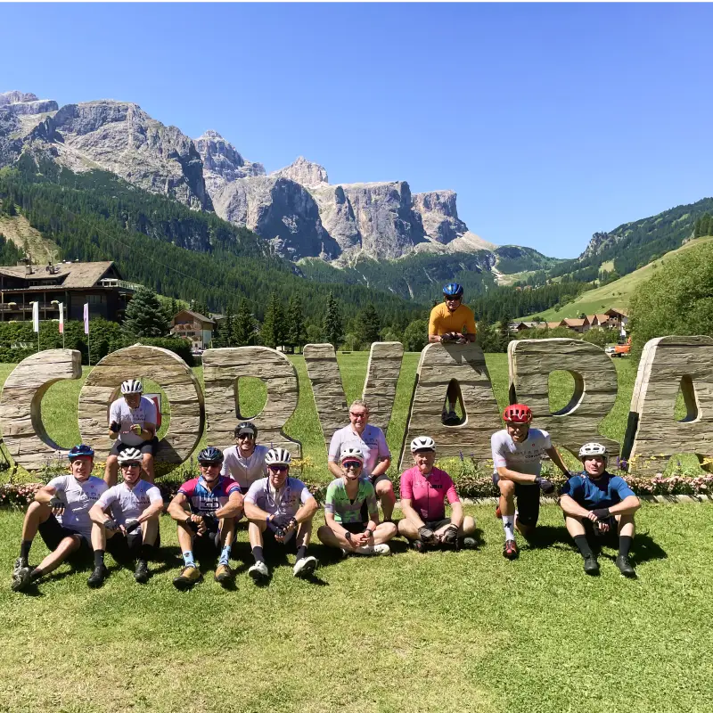 Group of cyclists in Corvara, ready to start their adventure on the Stelvio and Dolomites Bike Tour