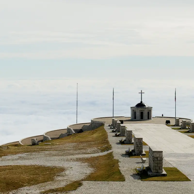 Monte Grappa War Memorial rising above the clouds in Veneto
