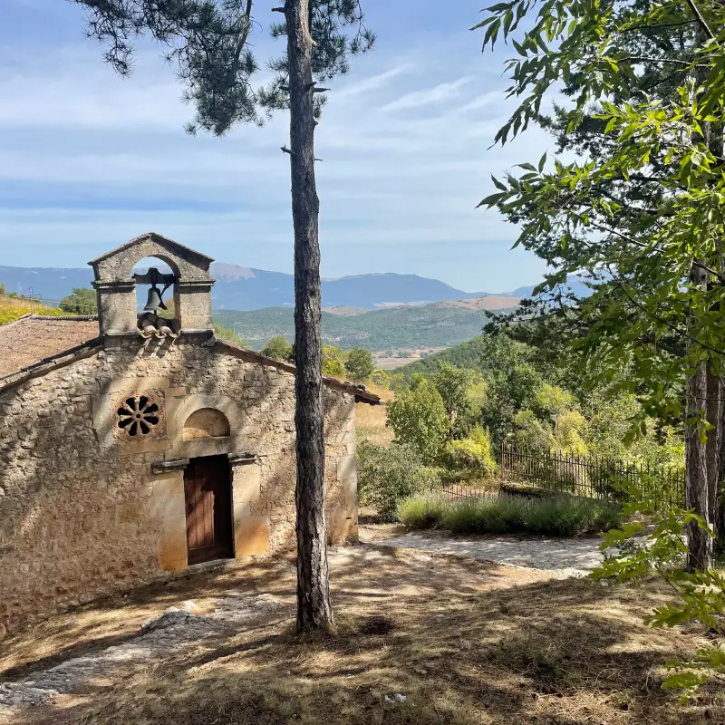 Oratorio di San Pellegrino in Bominaco surrounded by nature in the Abruzzo hills