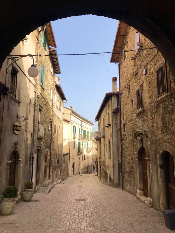 Narrow cobbled street and stone houses in Scanno, one of Abruzzo’s most beautiful villages