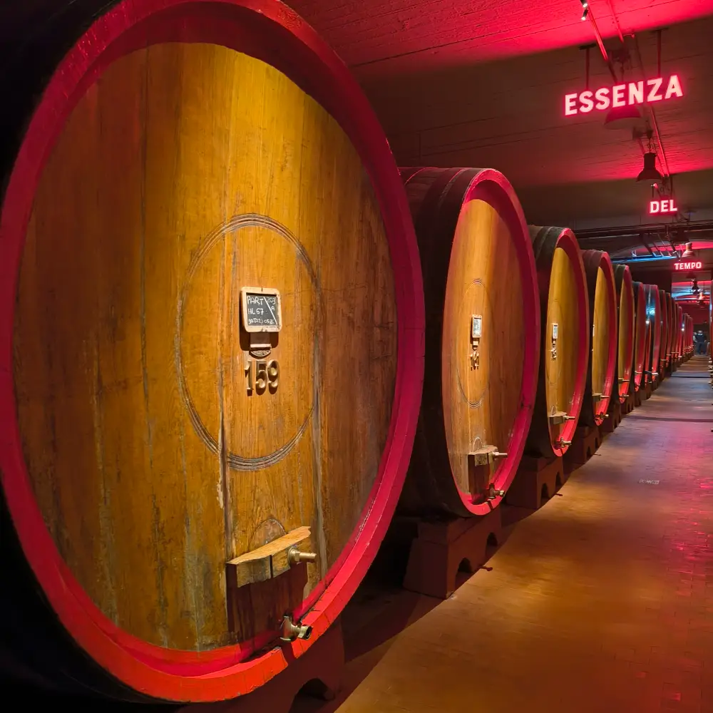 Inside the historic Braulio cellars in Bormio with large oak barrels used for aging the famous alpine amaro